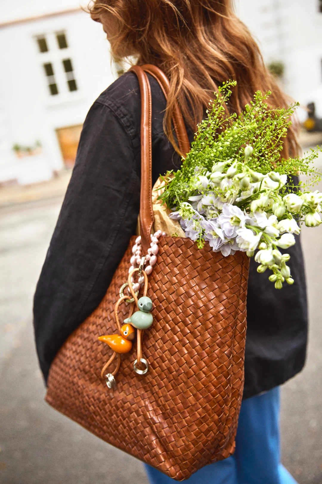Kay Bojesen Fugl sølvtonet metal nøglering med naturlæder orange